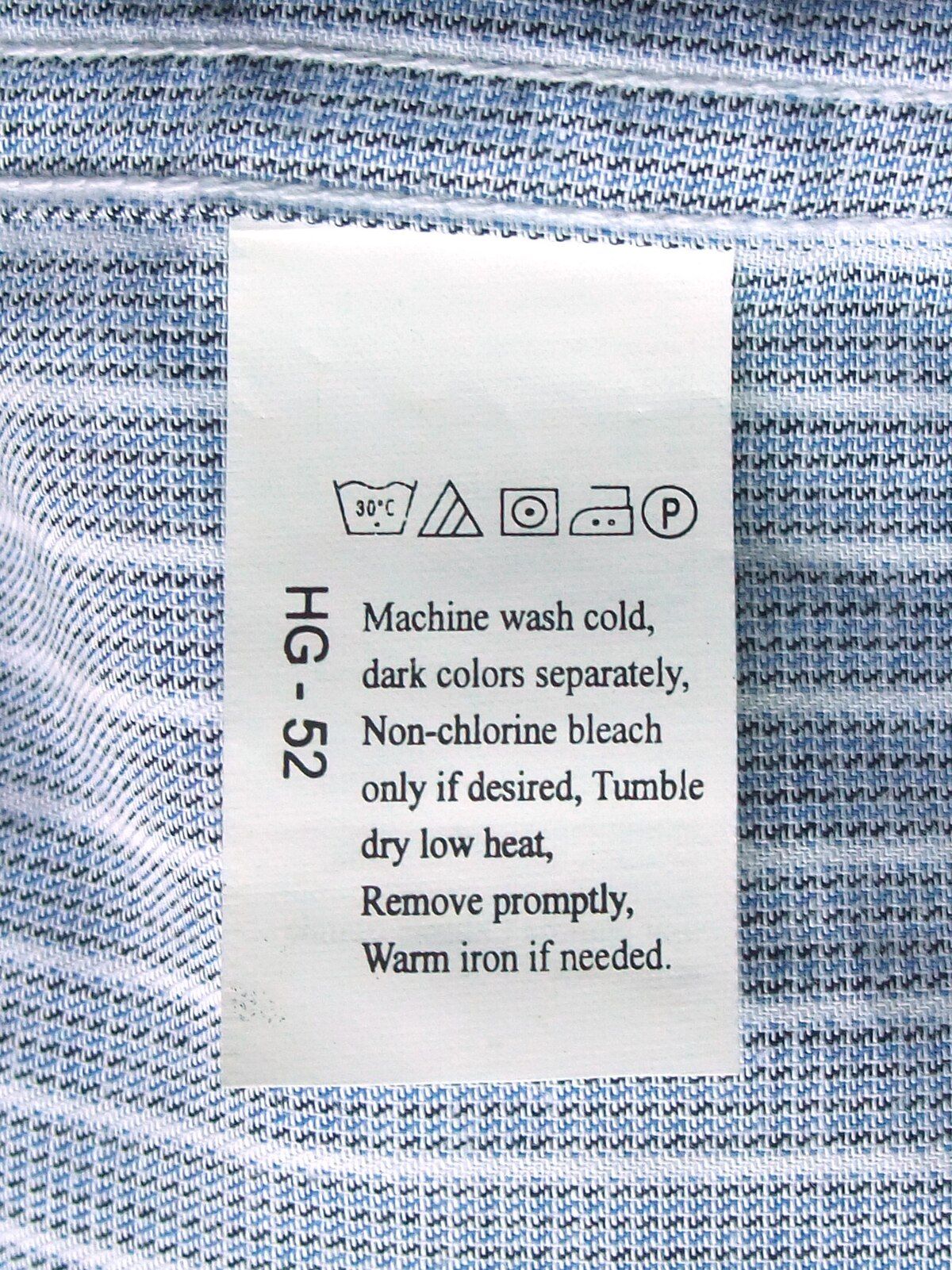 Care label sewn into a garment side seam