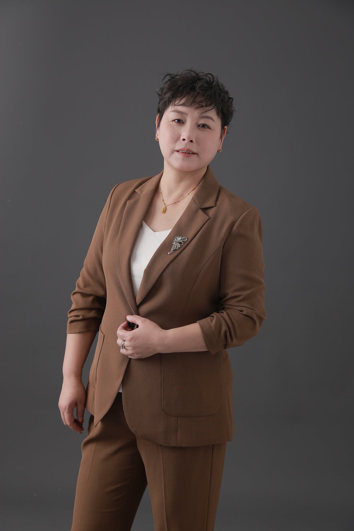 Studio portrait of Celine Lee, founder of Dongguan Hualingniao Apparel