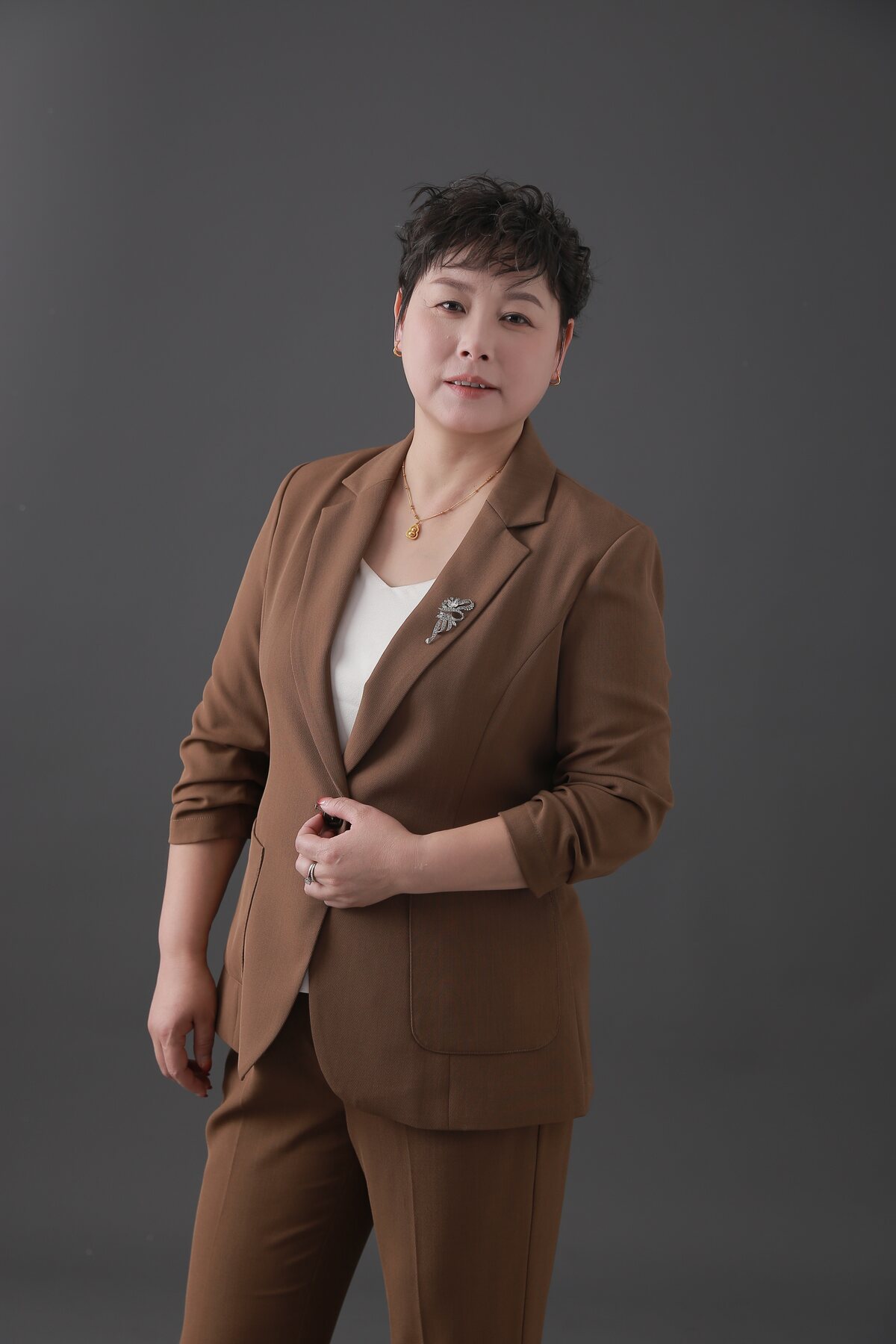 Studio portrait of Celine Lee, founder of Dongguan Hualingniao Apparel