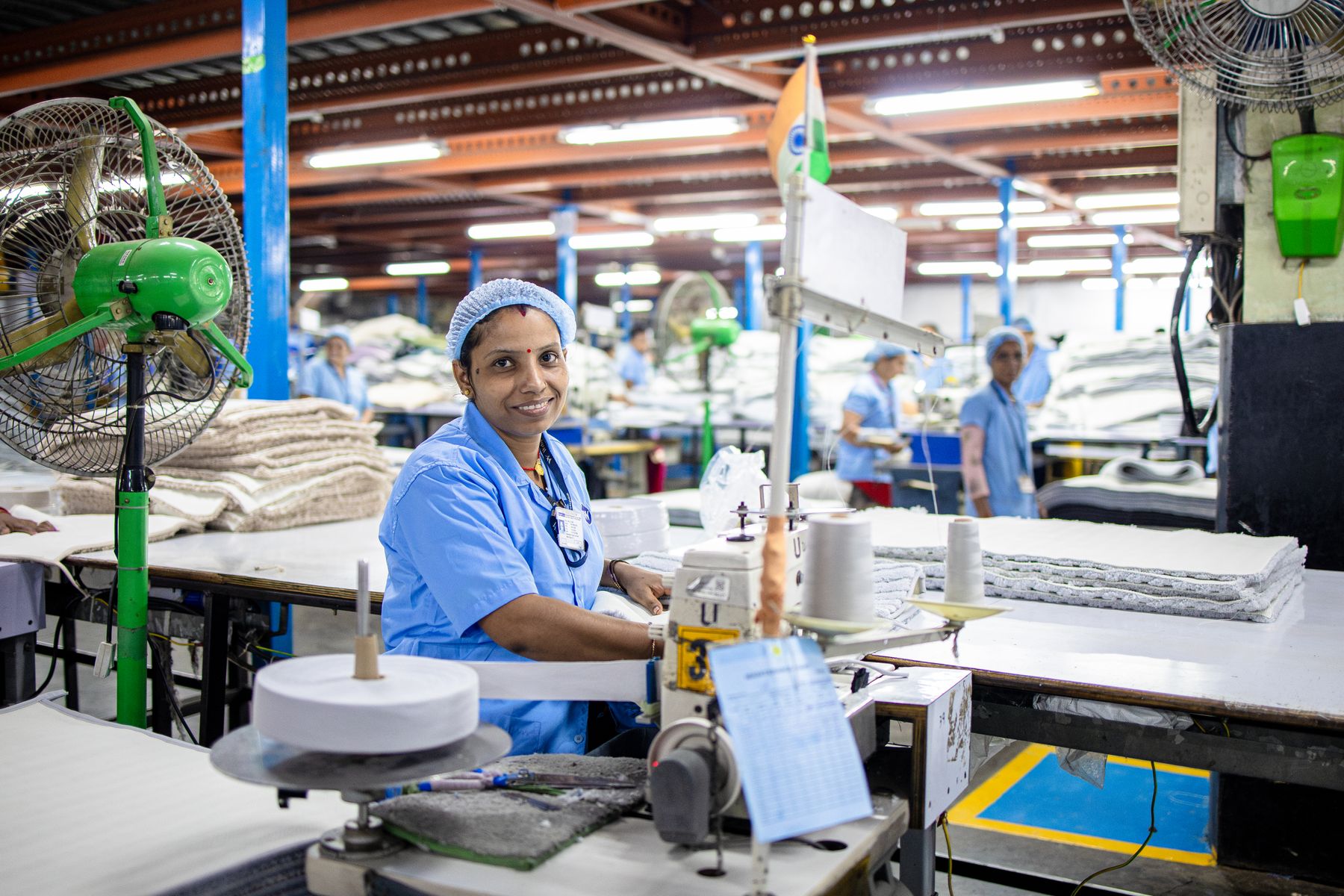 Operator working at an industrial sewing machine